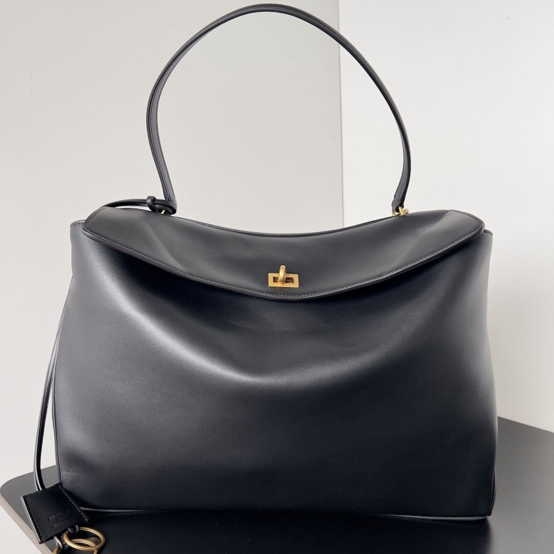 Ba*len*cia*ga top handle bags